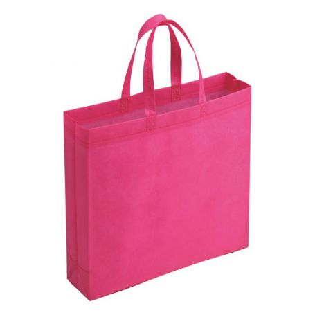 Shopping bag in TNT, 24.5 x 24.5 x 10 cm. Short handles.