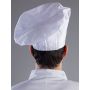 Chapeau de chef tendu sur le dos. Lavable à 40°C.  Fabriqué en Italie. Couleur Italien
