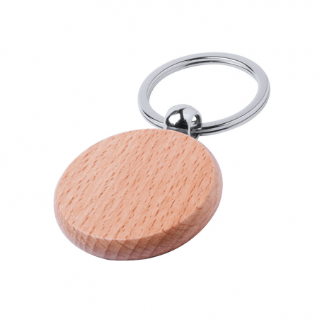 Keychain with round body in natural wood.