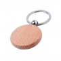 Keychain with round body in natural wood.
